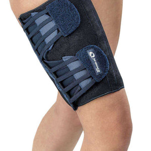 M-Brace Adjustable Compression Thigh Wrap providing support and compression for muscle strains, made with breathable AIRFLEX fabric.