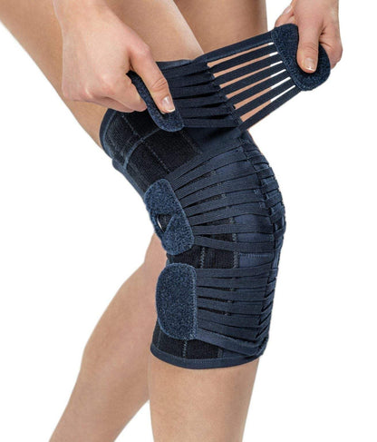 Knee brace support with adjustable straps and breathable fabric for stability.