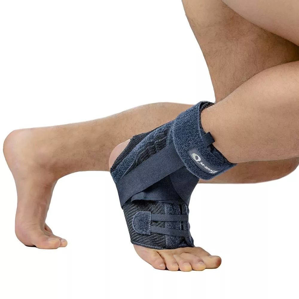 M-Brace Salto Ankle Stabilizer providing support for ankle injuries.